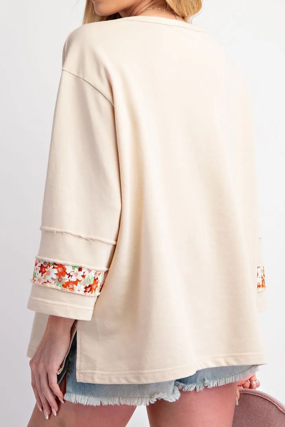 Exposed Seam Slit Floral Round Neck Blouse